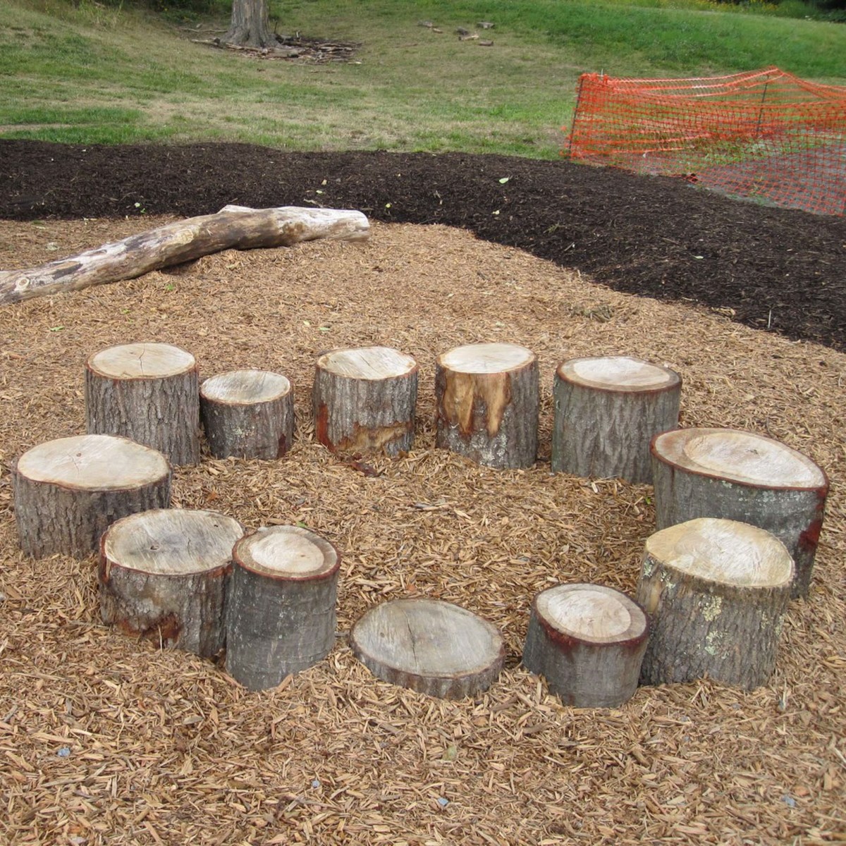 Natural play area with stumps. Source: play-scapes.com